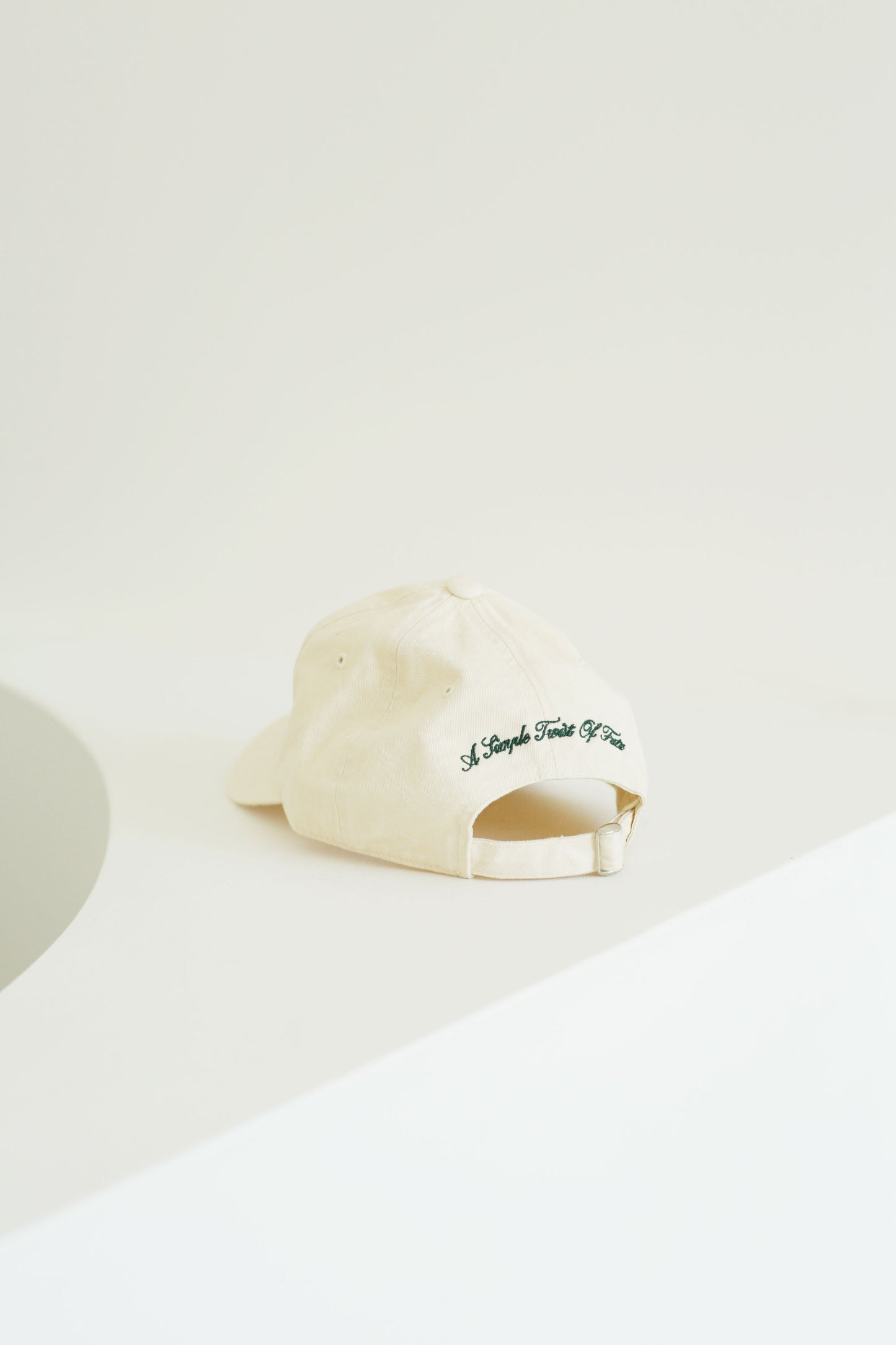 'A Simple Twist Of Fate' Creme Cap