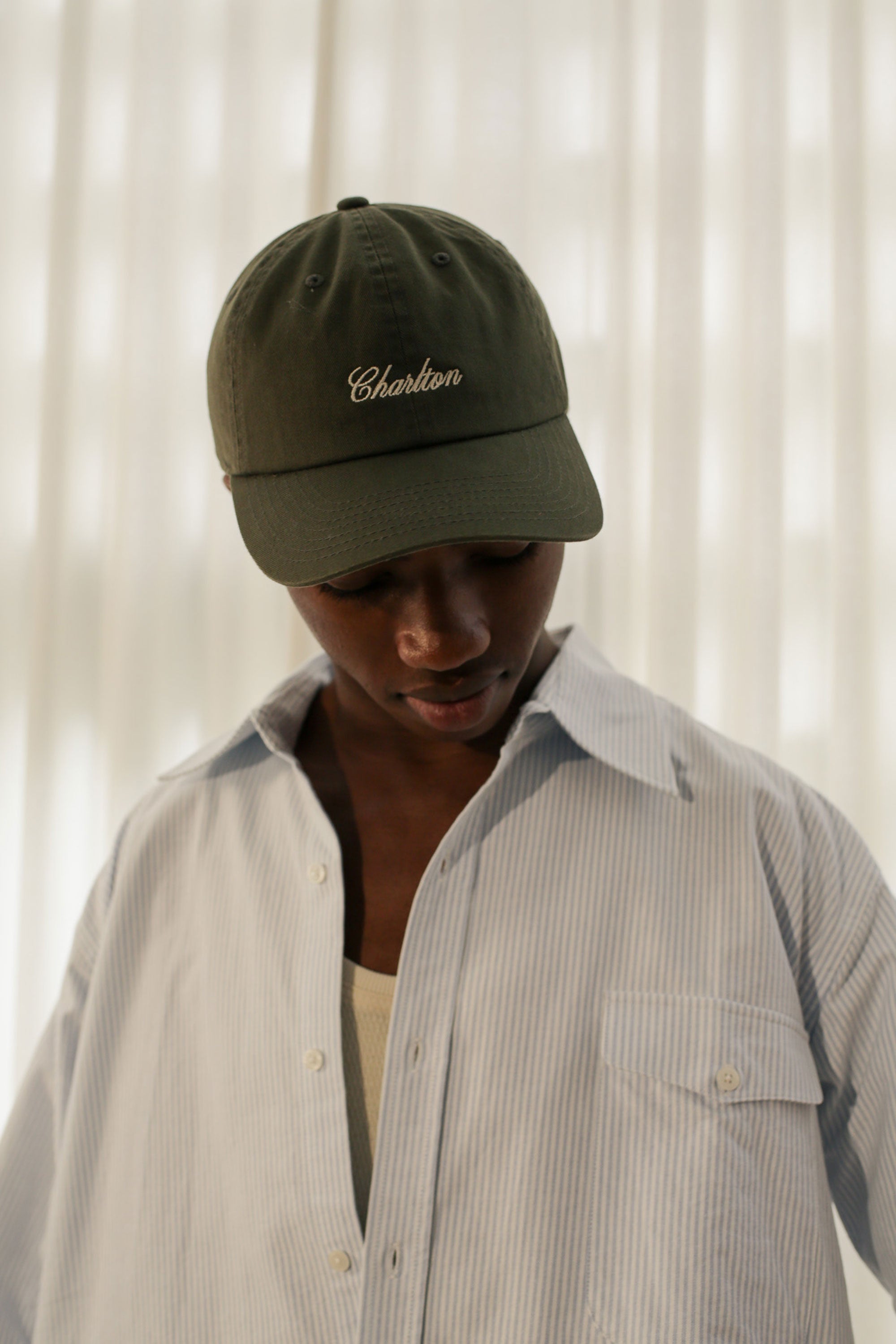 'A Simple Twist Of Fate' British Racing Green Cap